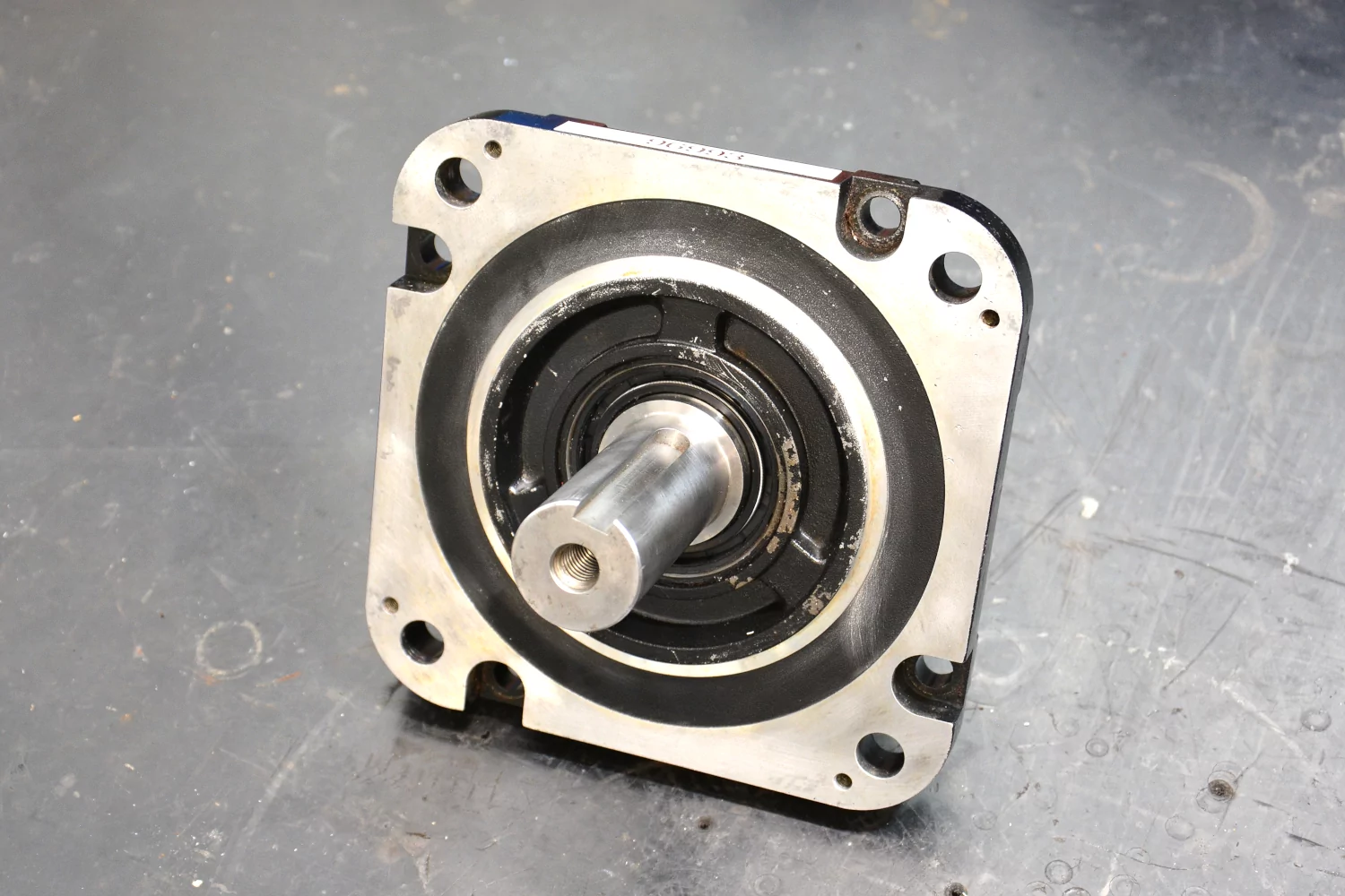 Front bearing cover including shaft seal.